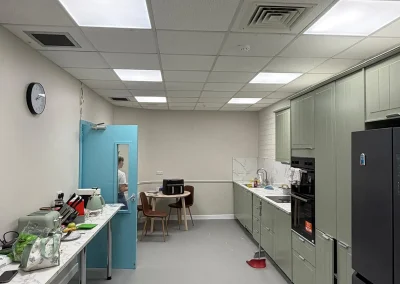 Ceiling panel lighting in a commercial kitchen.
