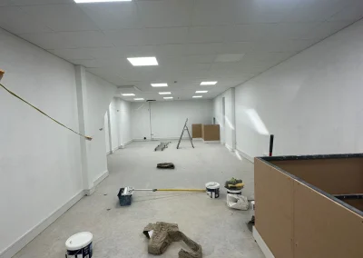 Ceiling panel lighting during a commercial fit-out.