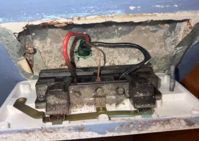 A close-up of older socket wiring.