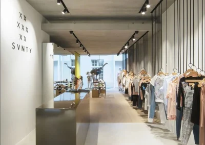 Track lighting across a retail interior.