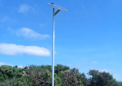 A solar-powered outdoor lighting column.