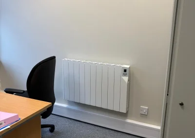 Wall-mounted electric heating in an office.